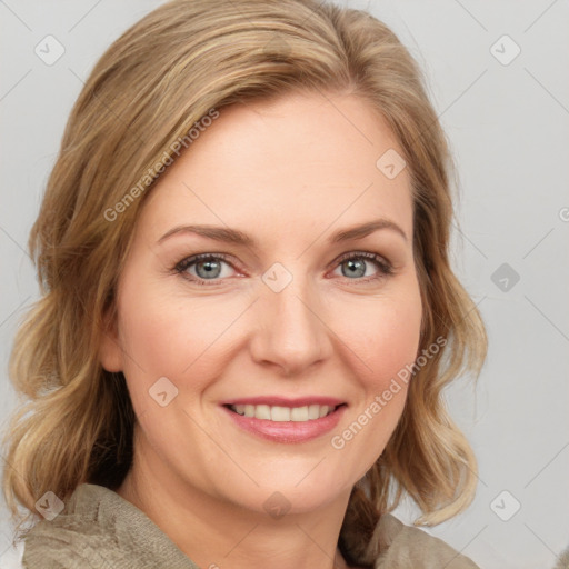 Joyful white young-adult female with medium  brown hair and blue eyes