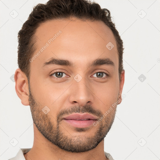 Joyful white young-adult male with short  brown hair and brown eyes