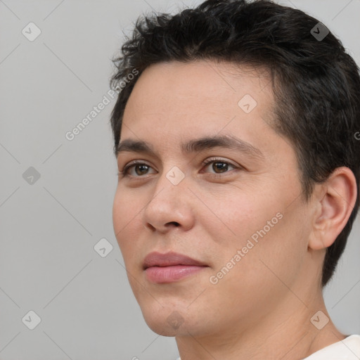 Neutral white young-adult male with short  brown hair and brown eyes