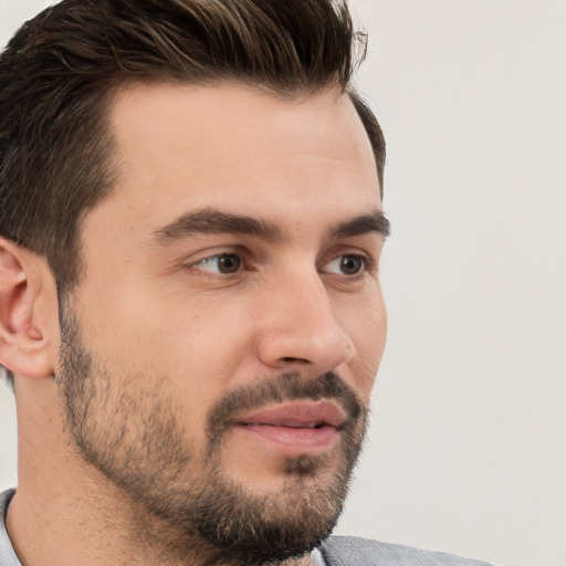 Neutral white young-adult male with short  brown hair and brown eyes