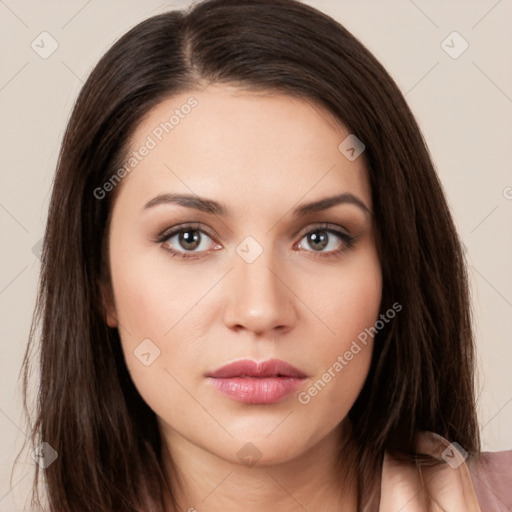 Neutral white young-adult female with long  brown hair and brown eyes