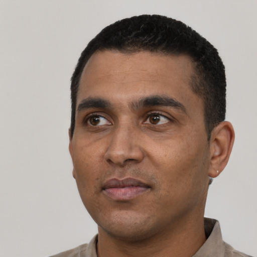 Neutral latino young-adult male with short  black hair and brown eyes