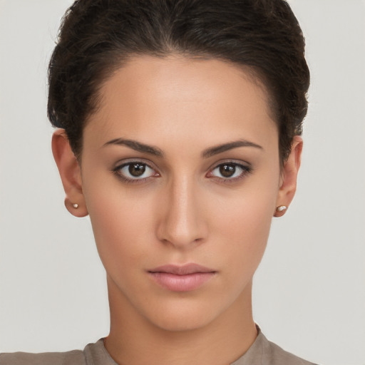 Neutral white young-adult female with short  brown hair and brown eyes