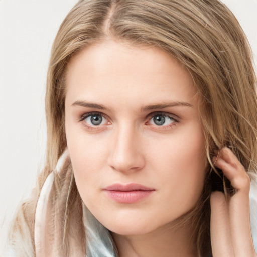 Neutral white young-adult female with long  brown hair and grey eyes