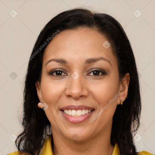 Joyful latino young-adult female with long  brown hair and brown eyes