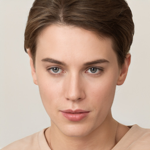 Neutral white young-adult female with short  brown hair and grey eyes