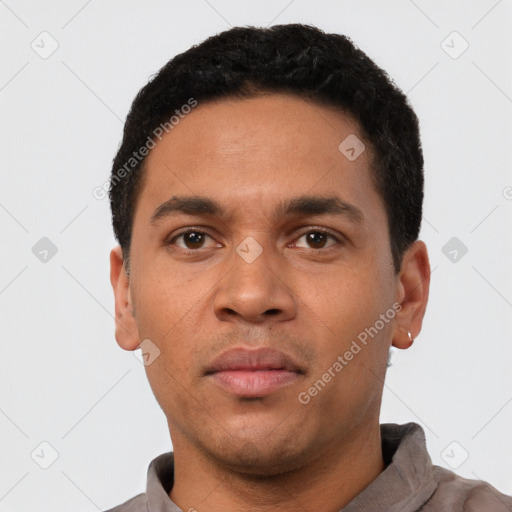 Neutral latino young-adult male with short  black hair and brown eyes