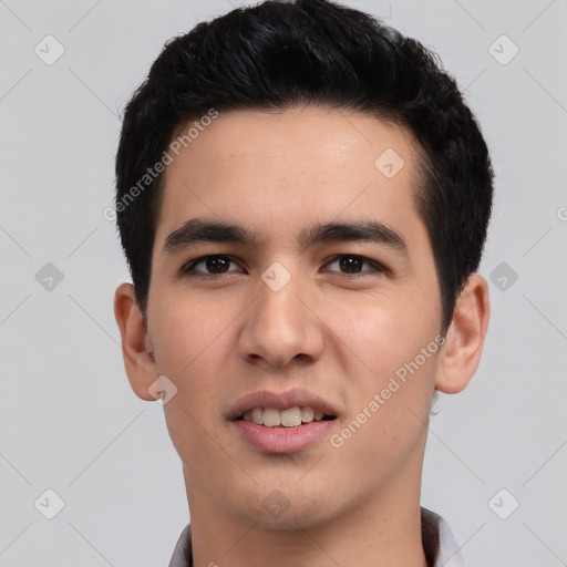 Joyful asian young-adult male with short  black hair and brown eyes