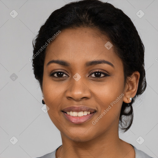 Joyful latino young-adult female with long  black hair and brown eyes