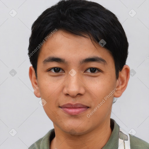 Joyful asian young-adult male with short  black hair and brown eyes