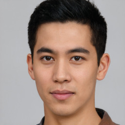 Neutral asian young-adult male with short  black hair and brown eyes