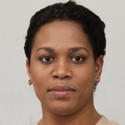 Neutral black young-adult female with short  brown hair and brown eyes