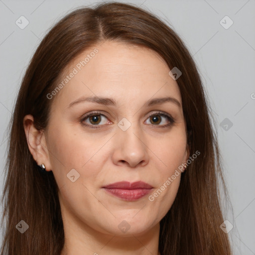 Joyful white adult female with long  brown hair and brown eyes