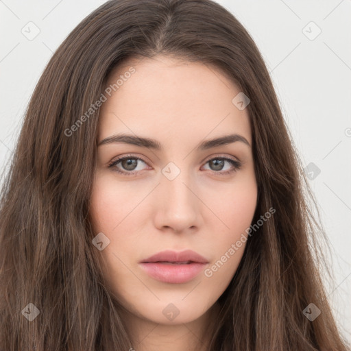 Neutral white young-adult female with long  brown hair and brown eyes