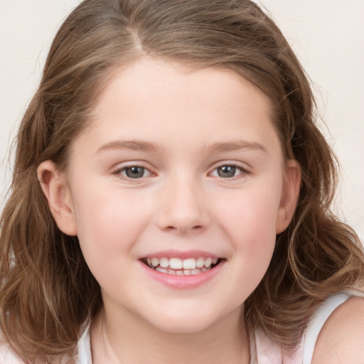 Joyful white child female with medium  brown hair and brown eyes