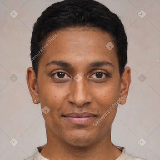 Joyful black young-adult male with short  black hair and brown eyes