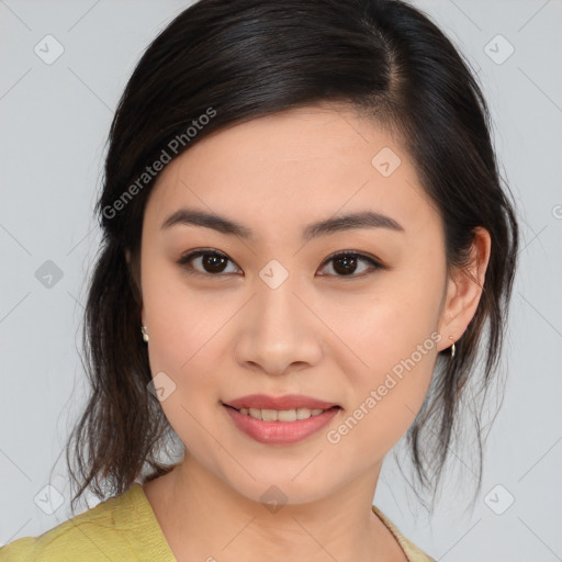 Joyful asian young-adult female with medium  brown hair and brown eyes