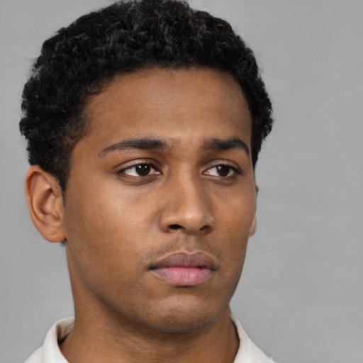 Neutral black young-adult male with short  brown hair and brown eyes