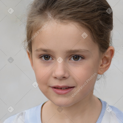 Joyful white child female with short  brown hair and brown eyes