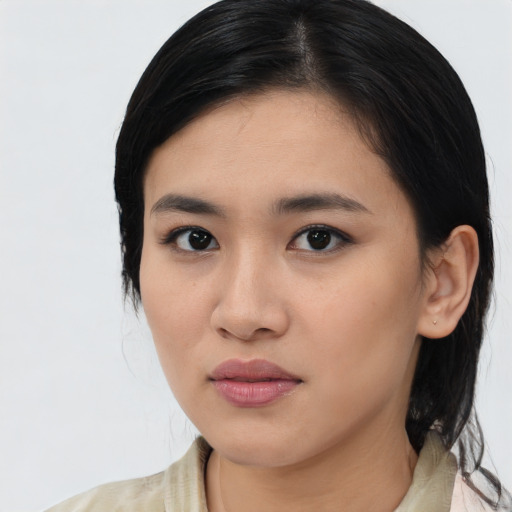 Neutral asian young-adult female with medium  black hair and brown eyes