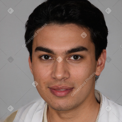 Joyful white young-adult male with short  black hair and brown eyes