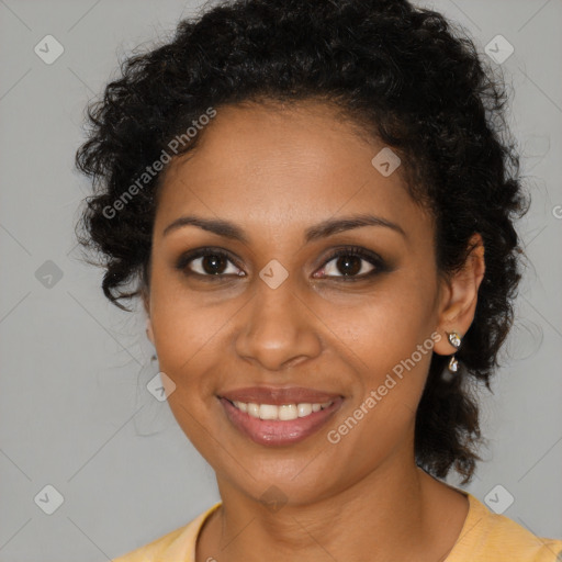 Joyful black young-adult female with medium  brown hair and brown eyes