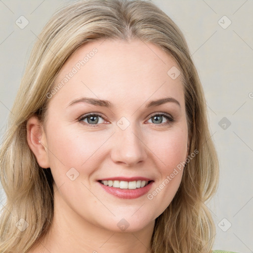 Joyful white young-adult female with medium  brown hair and blue eyes