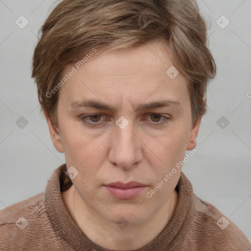 Joyful white adult female with short  brown hair and grey eyes