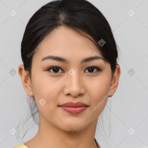 Joyful asian young-adult female with medium  brown hair and brown eyes