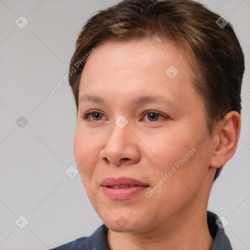 Joyful white adult female with short  brown hair and brown eyes