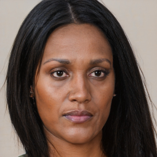 Joyful asian adult female with long  brown hair and brown eyes