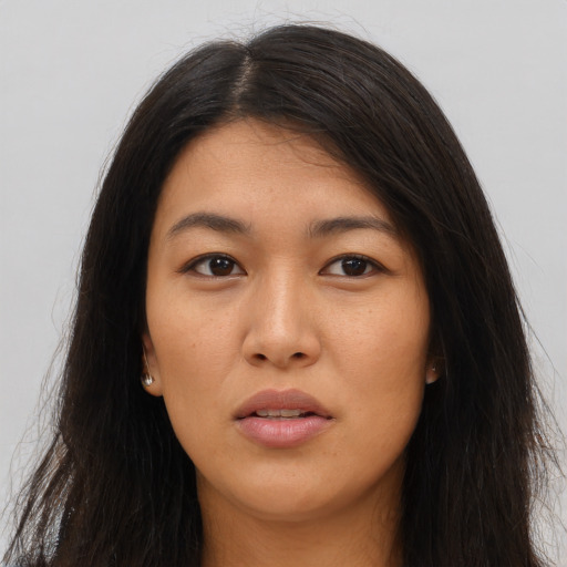 Neutral asian young-adult female with long  brown hair and brown eyes