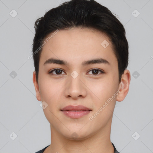 Joyful asian young-adult male with short  brown hair and brown eyes