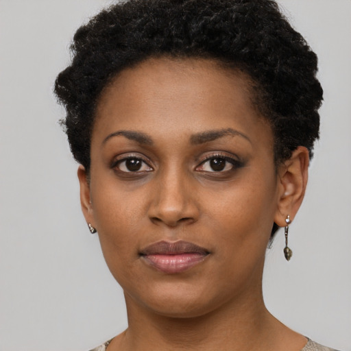 Neutral black young-adult female with short  brown hair and brown eyes