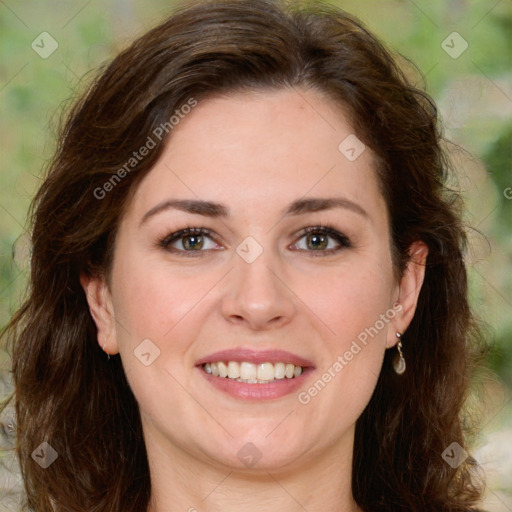 Joyful white young-adult female with long  brown hair and green eyes