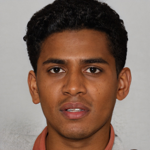 Neutral black young-adult male with short  brown hair and brown eyes