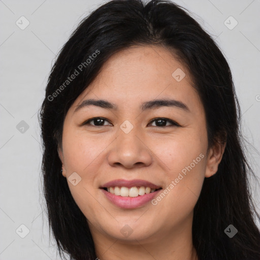 Joyful asian young-adult female with long  brown hair and brown eyes