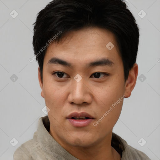 Neutral asian young-adult male with short  black hair and brown eyes