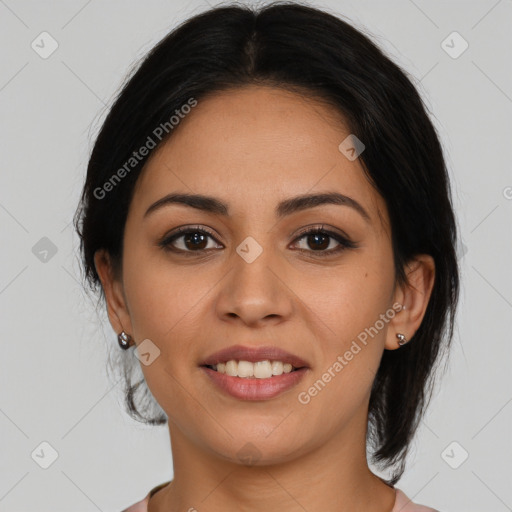 Joyful latino young-adult female with medium  brown hair and brown eyes