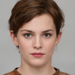 Neutral white young-adult female with short  brown hair and grey eyes