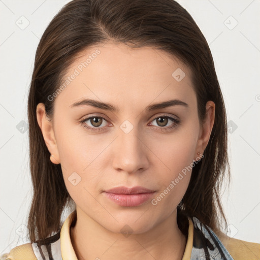 Neutral white young-adult female with medium  brown hair and brown eyes