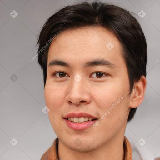 Joyful asian young-adult male with short  brown hair and brown eyes