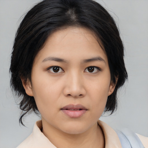 Neutral asian young-adult female with medium  black hair and brown eyes