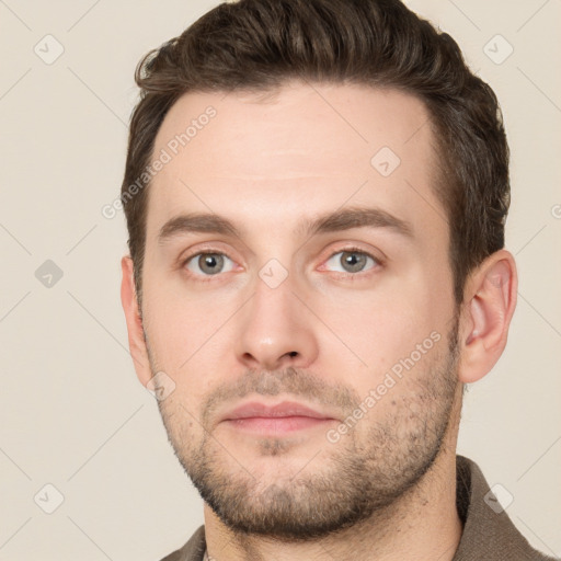 Neutral white young-adult male with short  brown hair and grey eyes