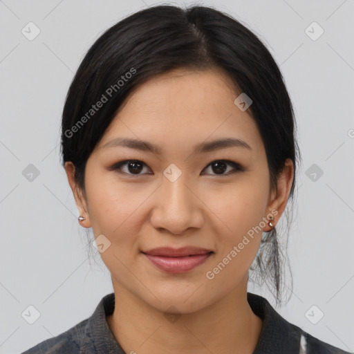 Joyful latino young-adult female with medium  black hair and brown eyes