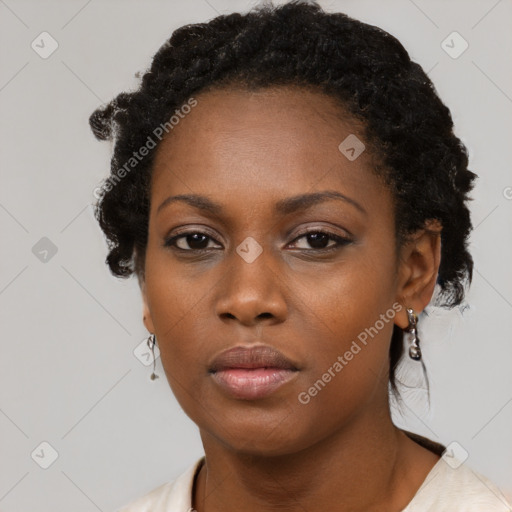 Neutral black young-adult female with short  black hair and brown eyes