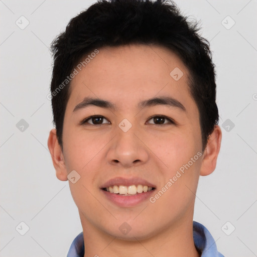 Joyful white young-adult male with short  black hair and brown eyes