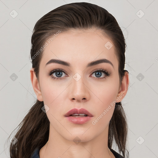 Neutral white young-adult female with medium  brown hair and brown eyes