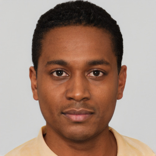 Neutral black young-adult male with short  black hair and brown eyes