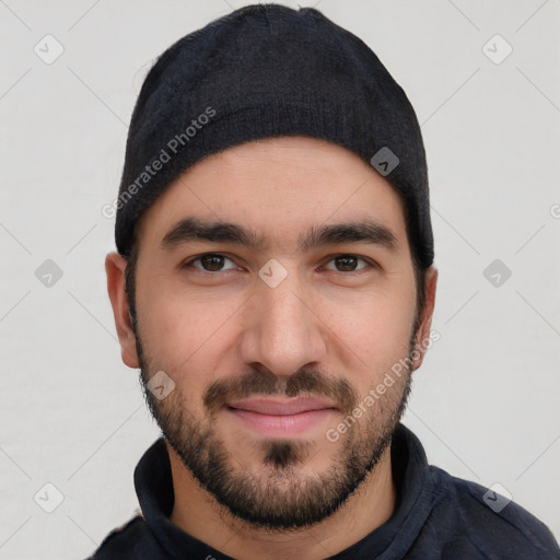 Joyful white young-adult male with short  black hair and brown eyes